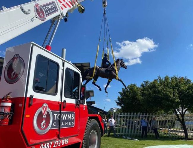 Statue Relocation-Towns Cranes